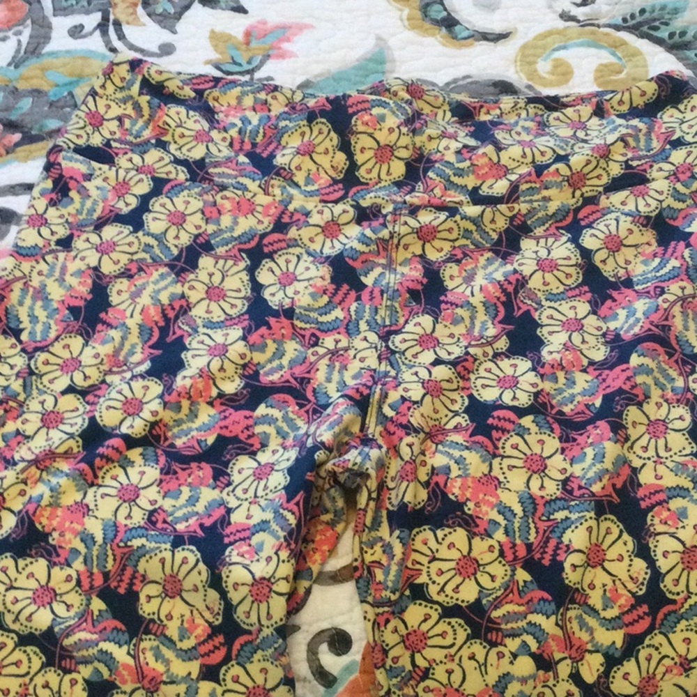 Brand new Lularoe Leggings, Size TC. Blue with Floral pattern in pink, blue